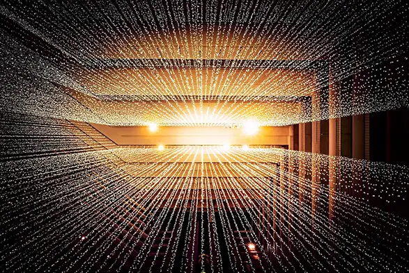 Cloud migration visualized with bright lights and data transferring from one system to another