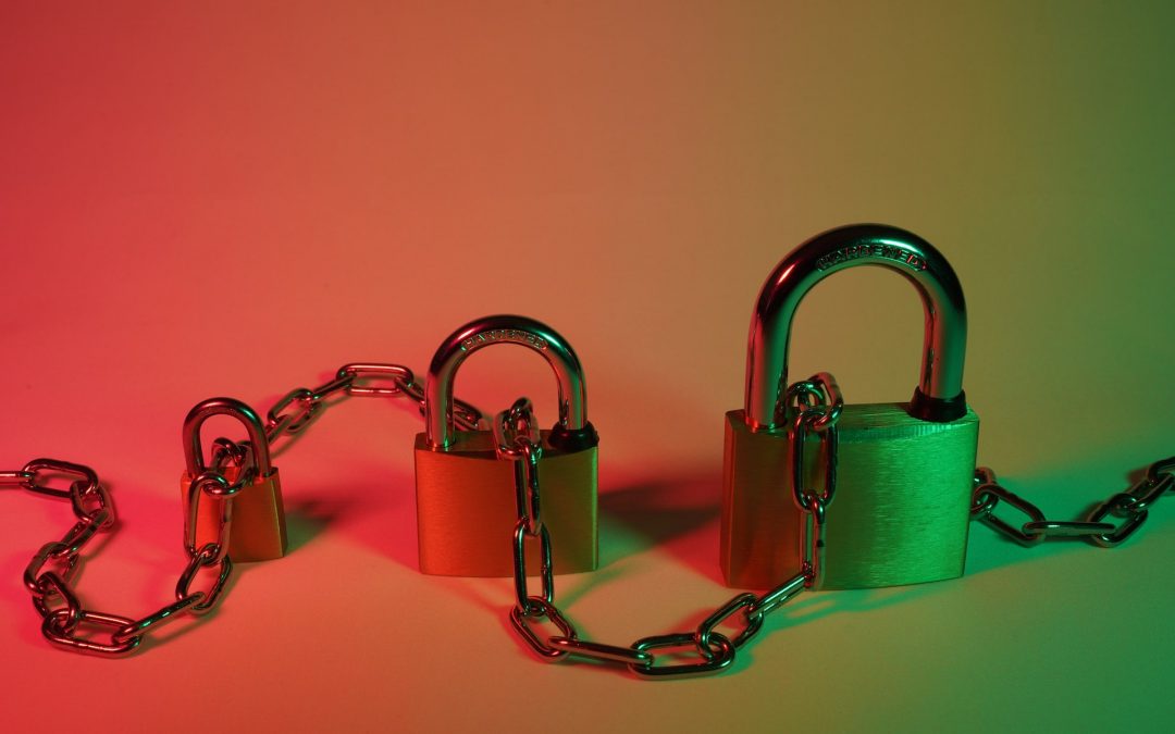 Cloud security represented by three differently-sized locks and a chain in-between them