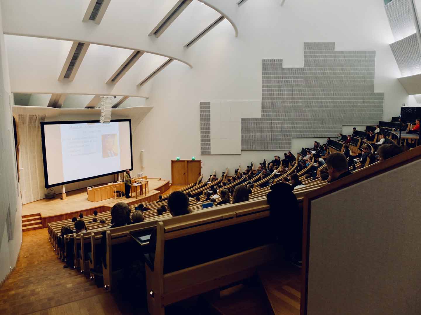 University lecture hall with professor presenting